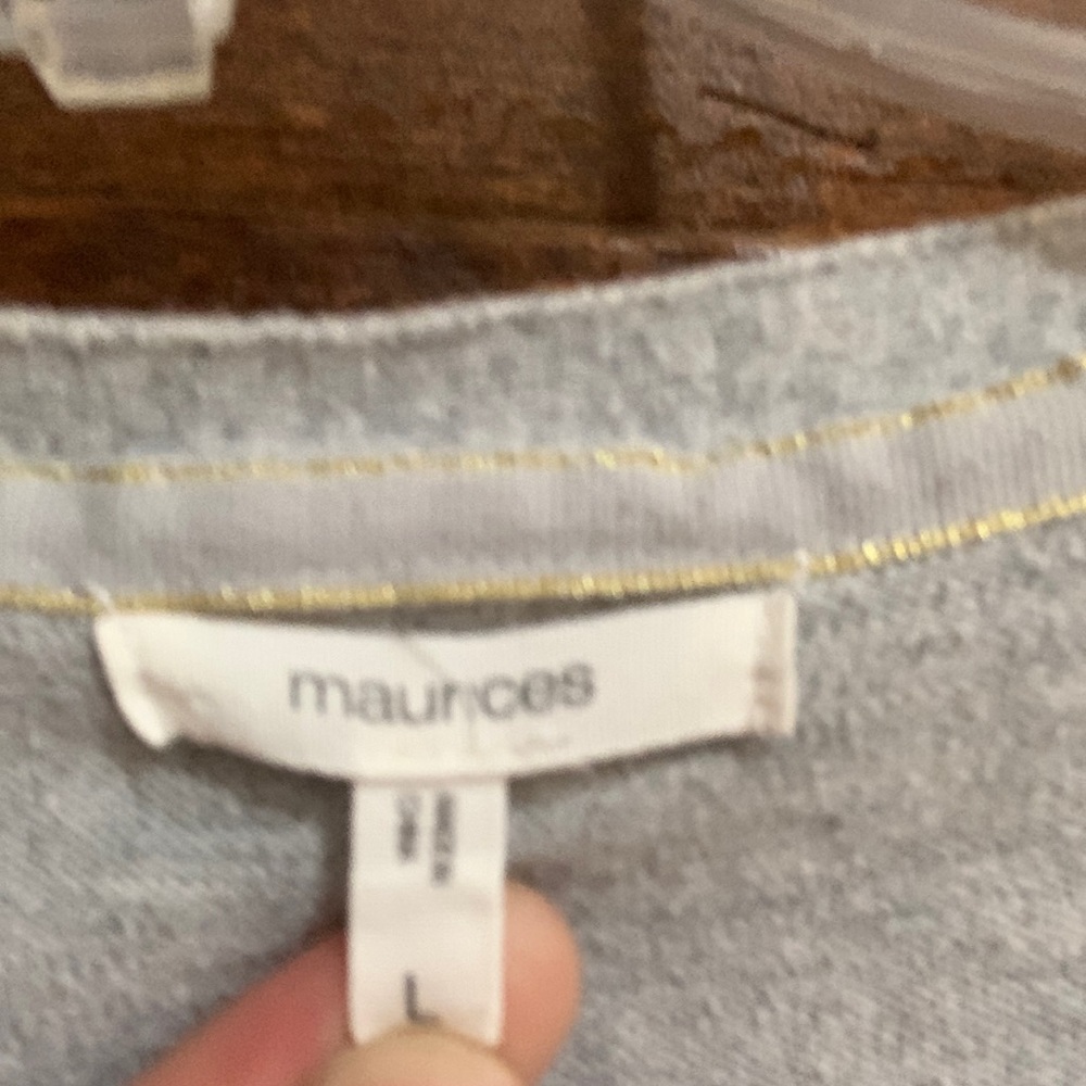 Maurice’s long sleeve lite weight sweater with pockets on the front